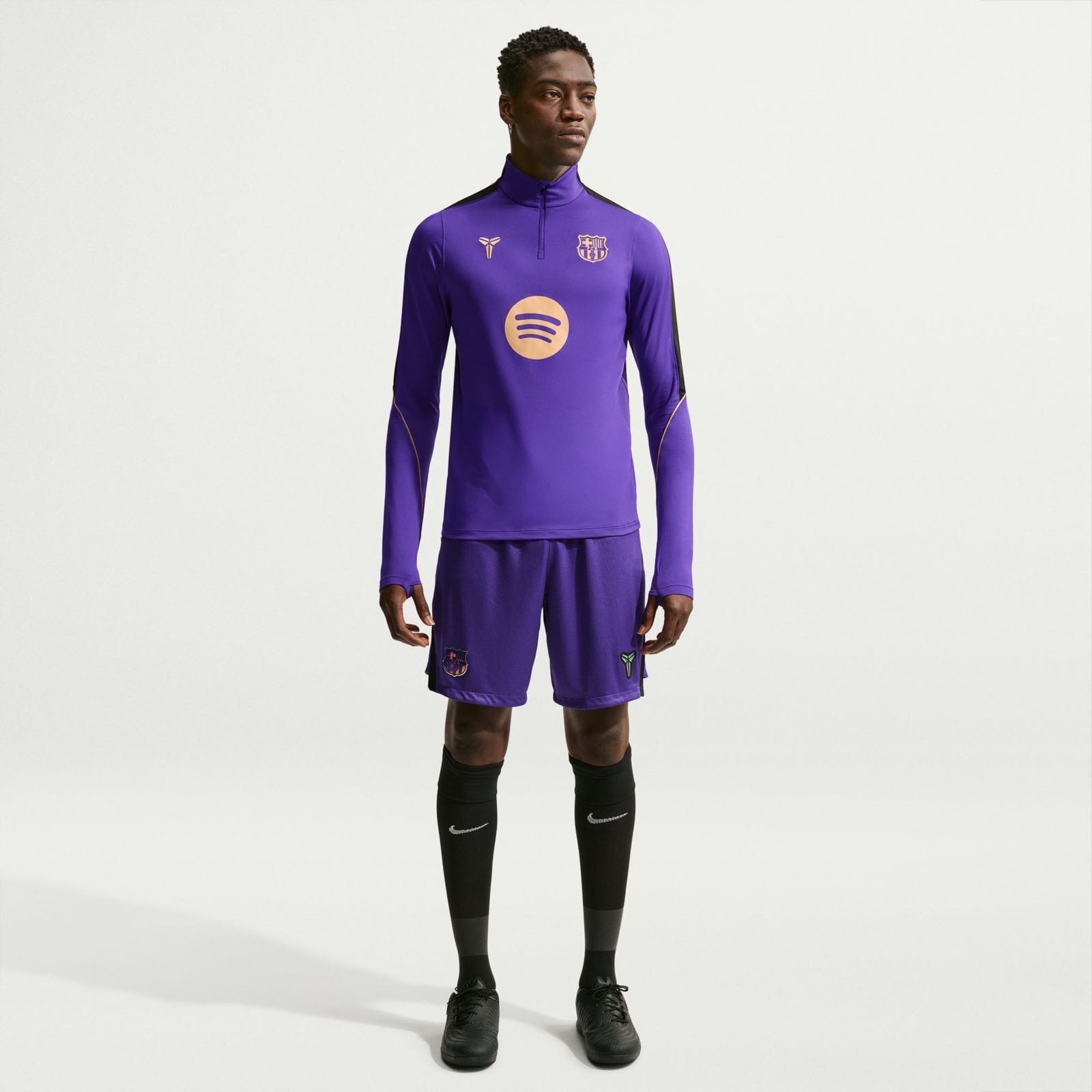 FC Barcelona Strike Away Kobe Dri-FIT soccer drill top in purple.