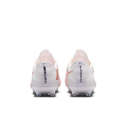 Nike Mercurial Superfly 11 Pro AG low-top artificial-grass soccer cleats in white with orange details and Air Zoom cushioning.